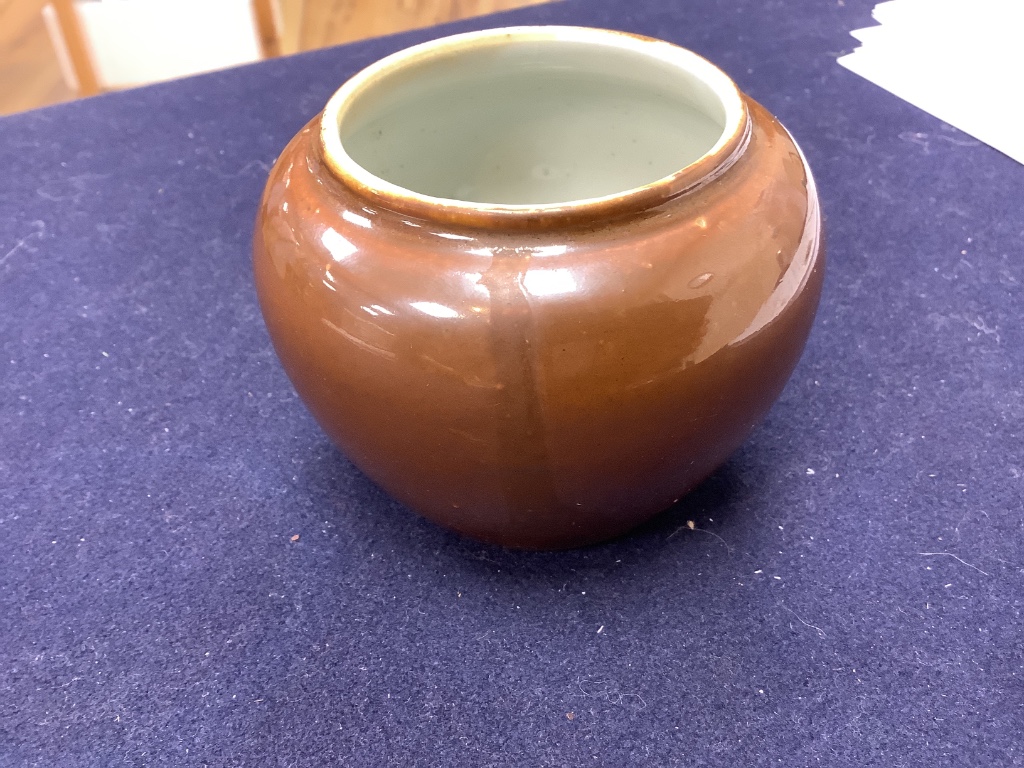 A Chinese cafe-au-lait glazed pot, Kangxi mark but later, height 7cm